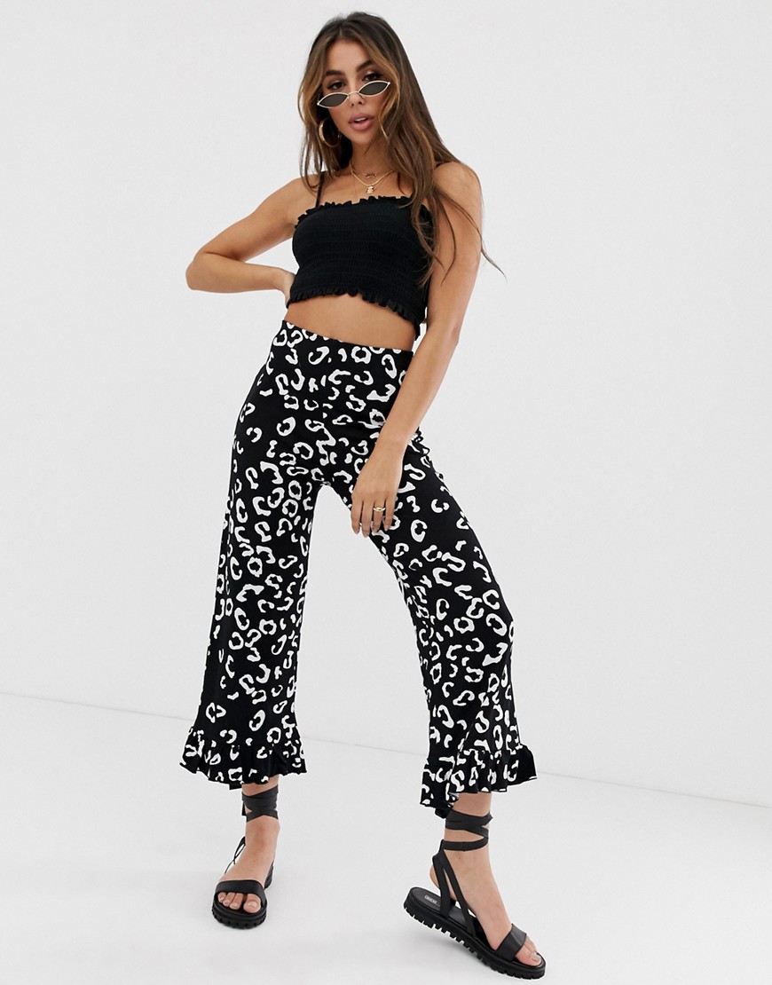 ASOS DESIGN trousers with fluted ruffle hem in mono animal print