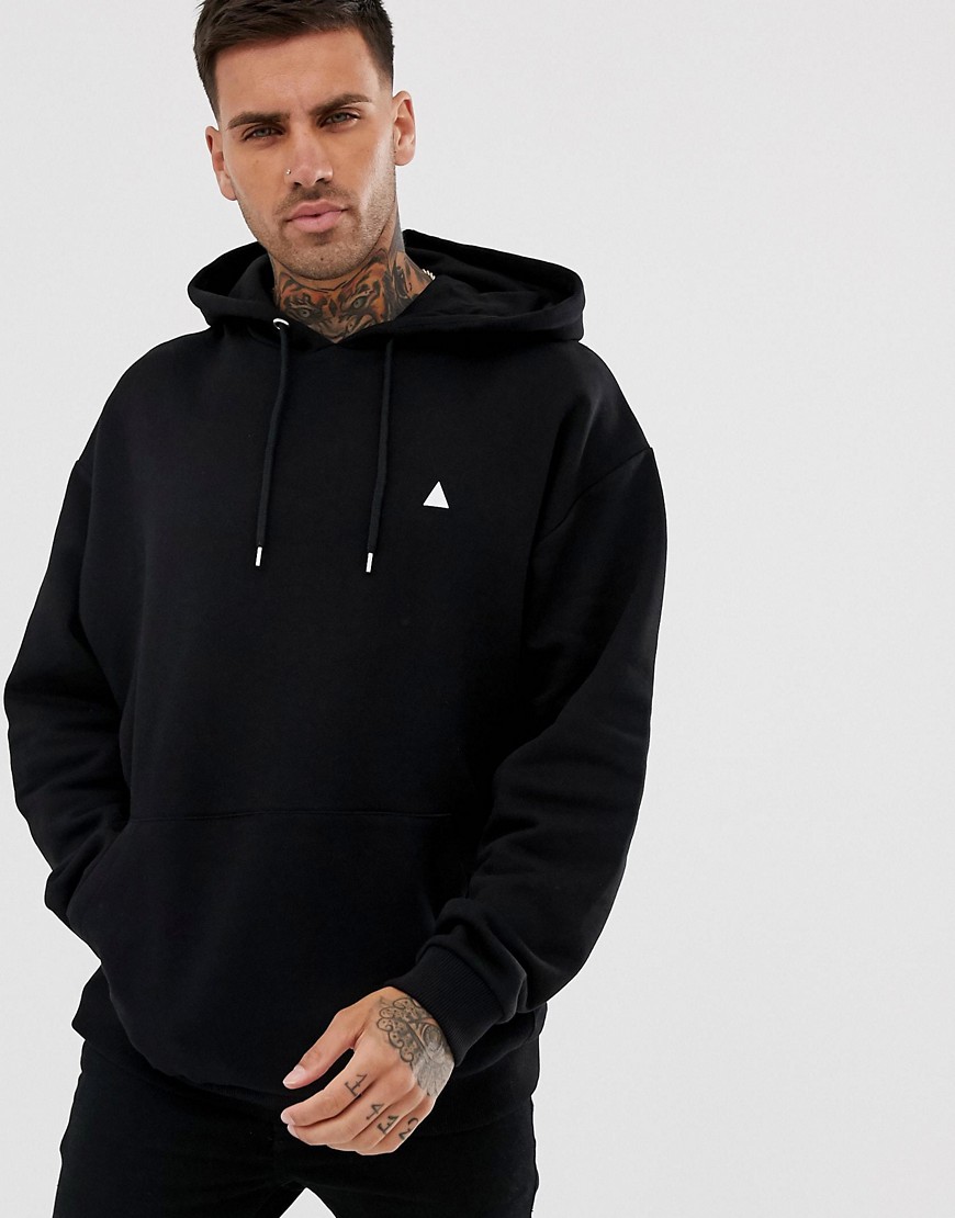 ASOS DESIGN oversized hoodie in black with triangle