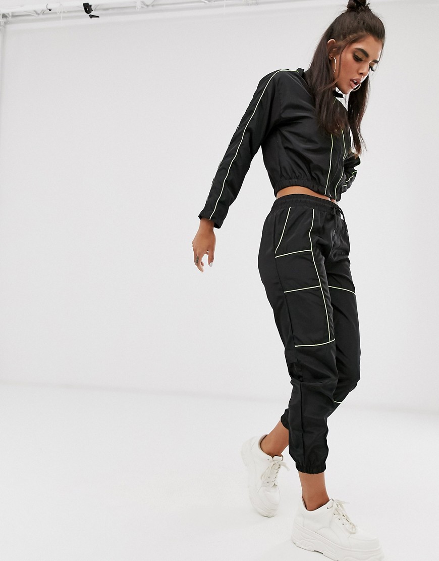 QED London contrast piping elasticated cuff joggers in black and lime