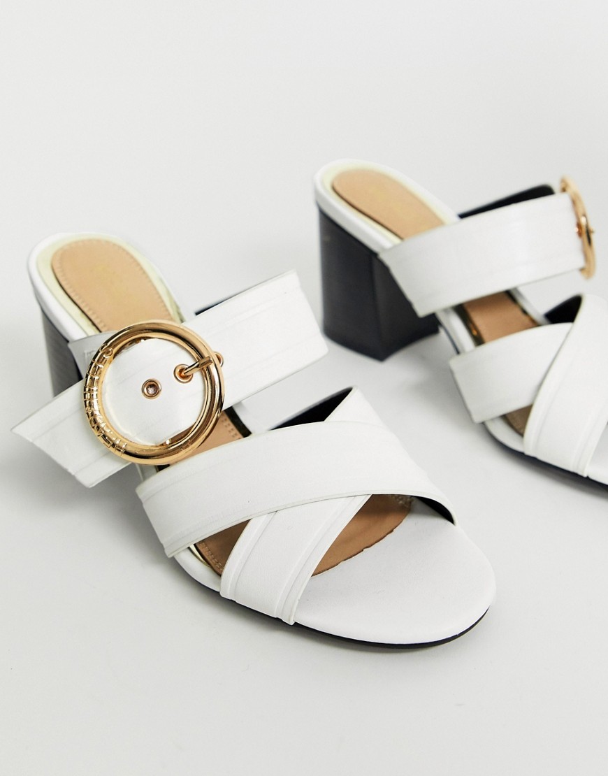 Head Over Heels Joliee white slip on heeled mules with gold buckle ring detail