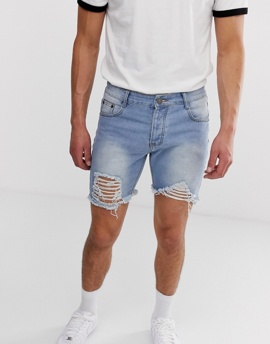 boohooMAN slim denim shorts in blue with rips