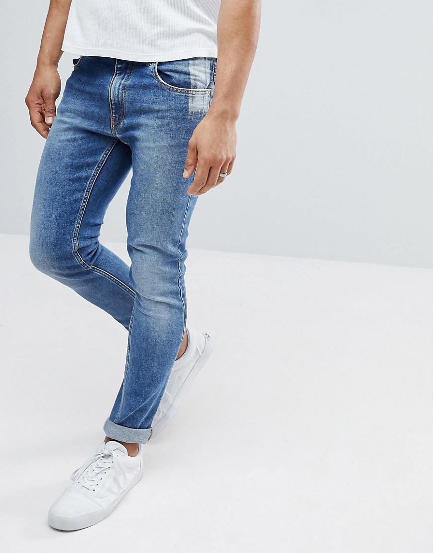 Love Moschino Skinny Fit Jeans With Back Tab Branding - Blue