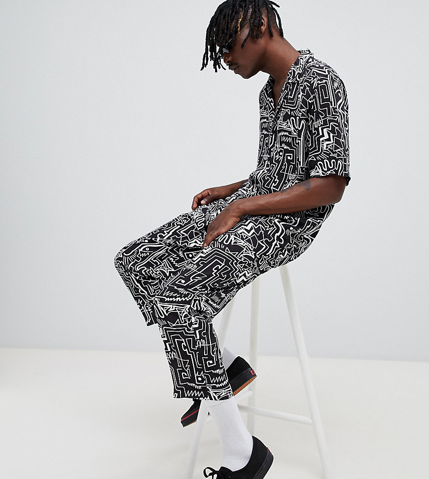 Reclaimed Vintage inspired face print trousers