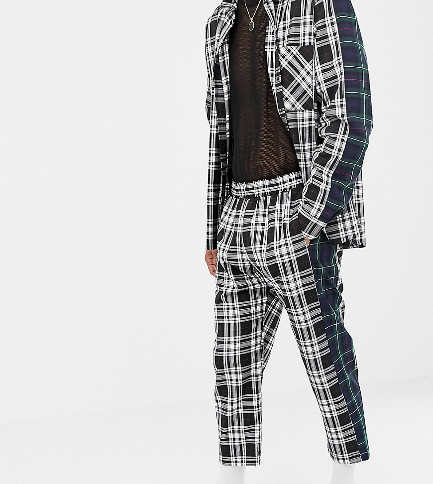 Milk It Vintage relaxed check trousers with contrast side stripe