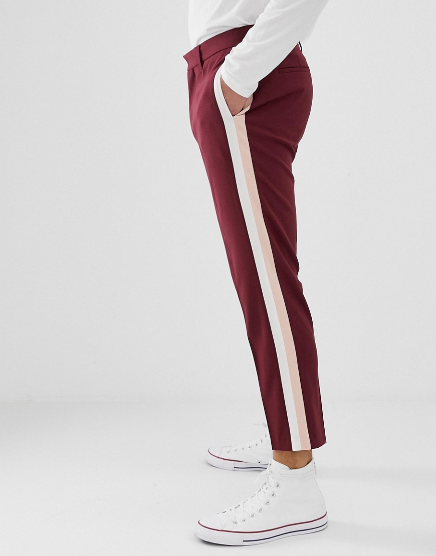 ASOS DESIGN skinny trousers in burgundy with double side stripe