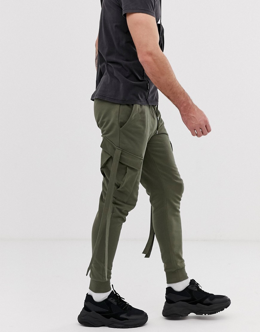 ASOS DESIGN skinny joggers with cargo pockets and strapping in khaki