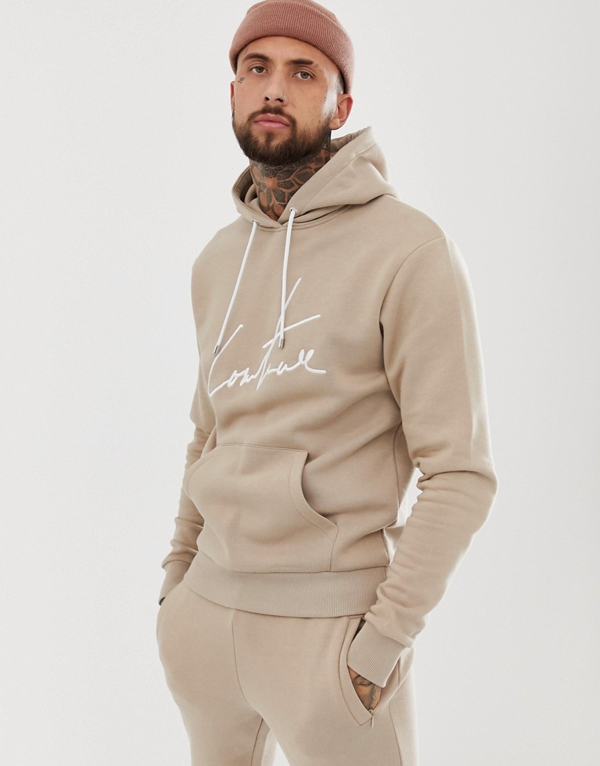 The Couture Club hoodie with signature logo in beige