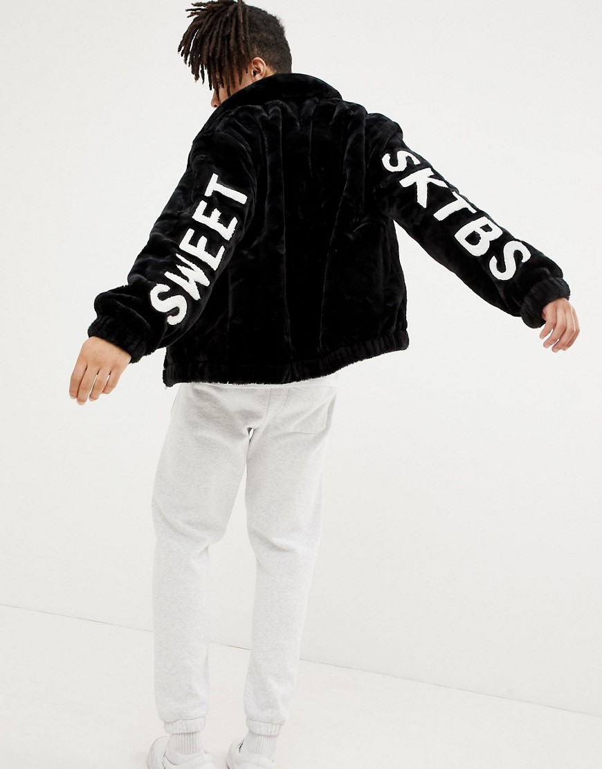 SWEET SKTBS Faux Fur Jacket with Back Logo in Black