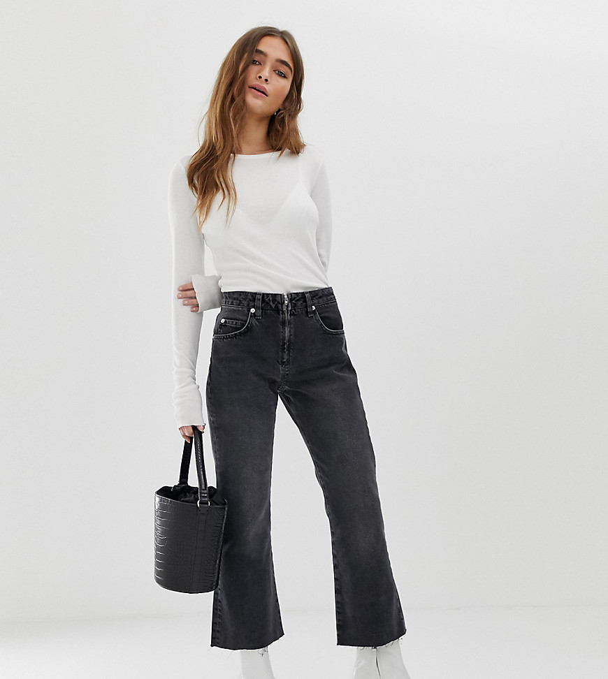 ASOS DESIGN Petite Egerton rigid cropped flare jeans in washed black with zip fly detail