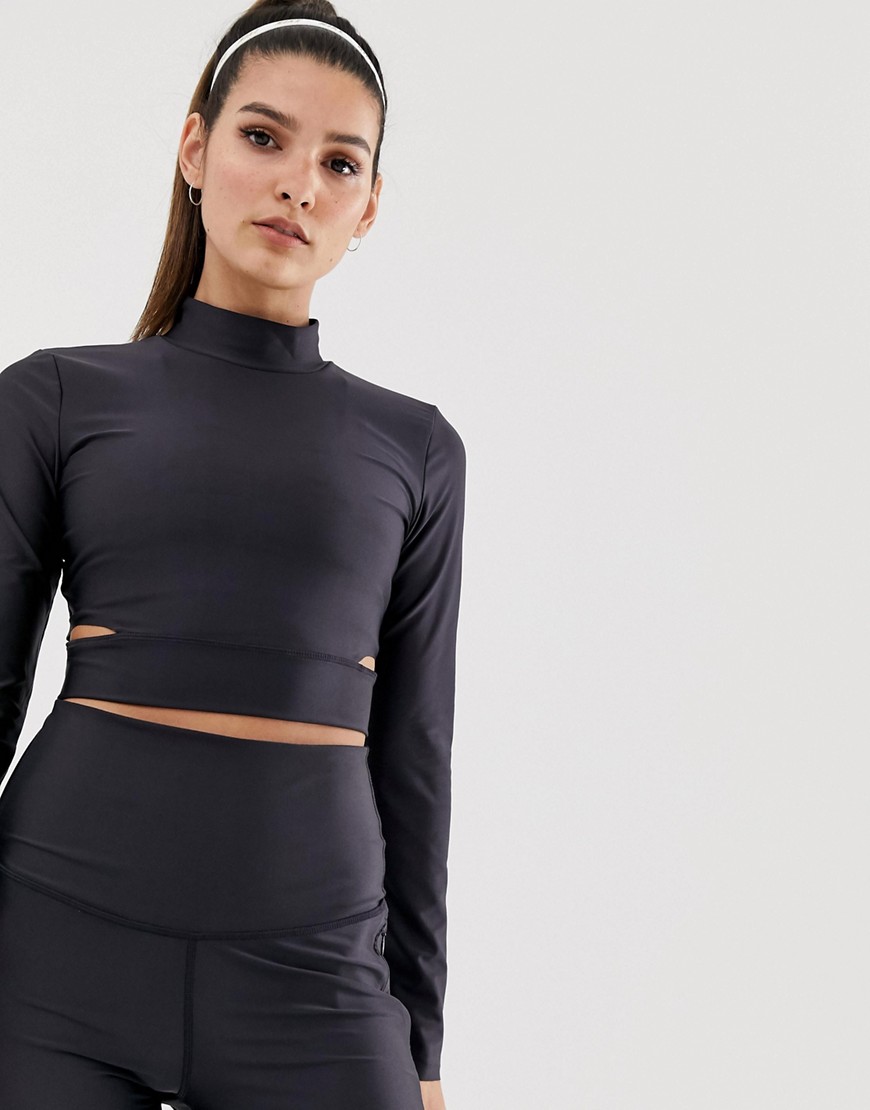 Nike Training cropped long sleeve t-shirt with side cut outs in black