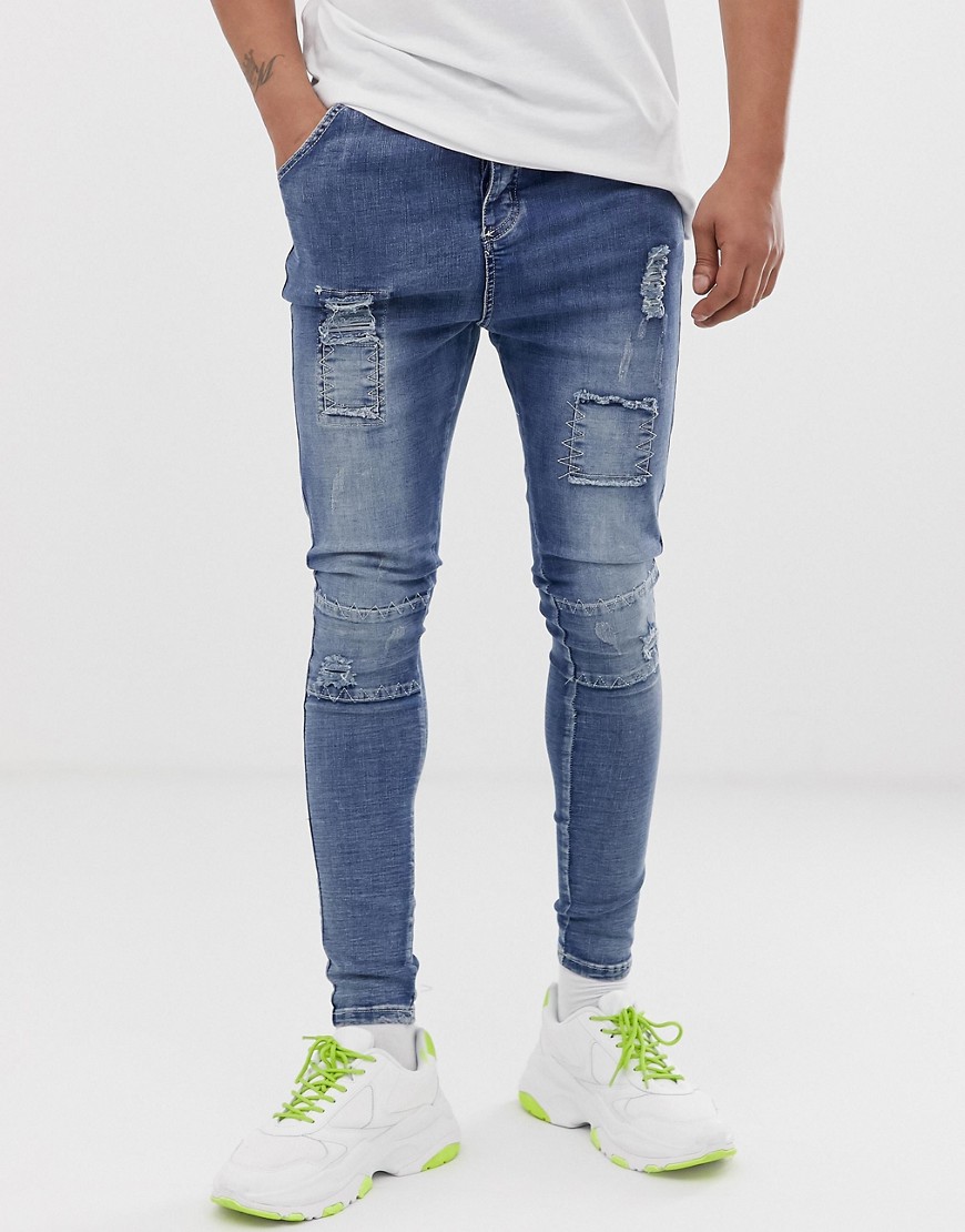 SikSilk skinny jeans in washed blue with distressing