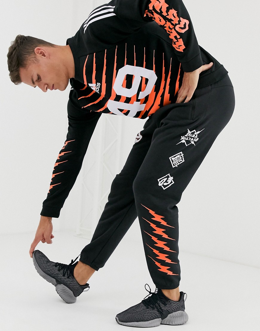adidas Training GRFX graphic pants in black