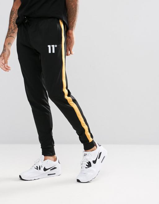 11 Degrees Skinny Track Joggers In Black With Yellow Stripe ASOS