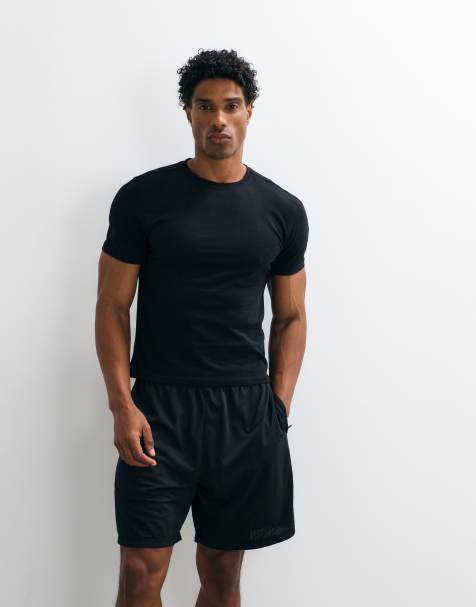 4504 baby t-shirt i krympt passform i bomull med quick dry-finish i svart - view 1