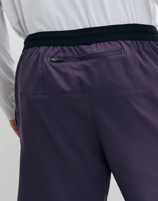 4505 5" running short with elastic waist and zip phone pocket in purple, 3 of 5