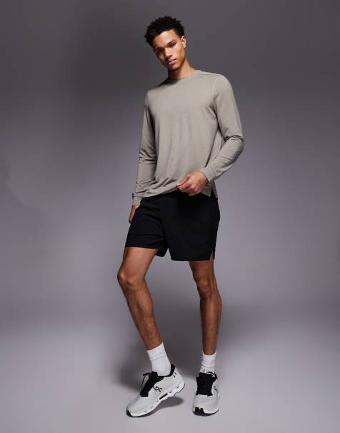 4505 5" running shorts with elastic waist band and phone pocket in black - view 1