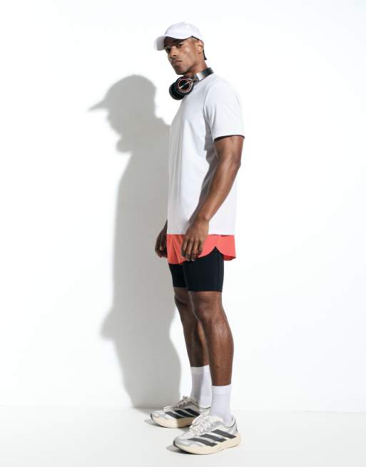 4505 5cm running shorts with elastic waist band and zip pockets in tomato, 5 of 6