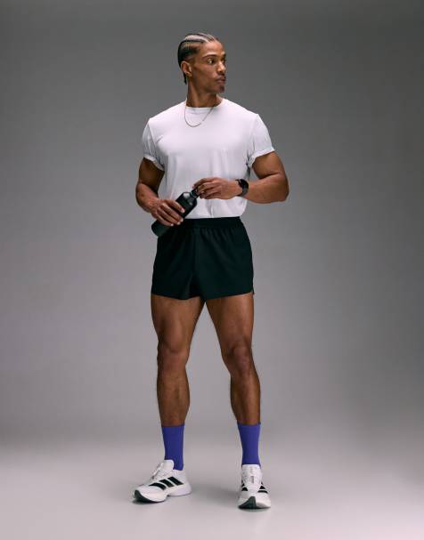 4505 5cm ultra-short running shorts with elastic waist band and zip pockets in black - view 1