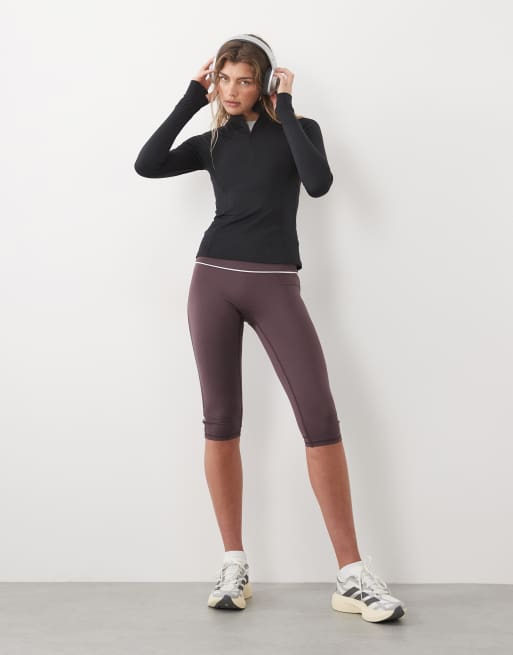 4505 active 1/4 zip long sleeve running top with zip back pocket in black, 2 of 4