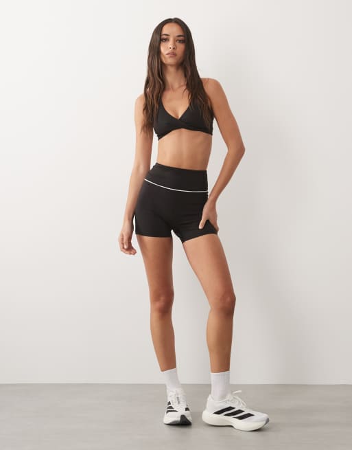4505 active 3" booty shorts with piping detail in black, 4 of 5
