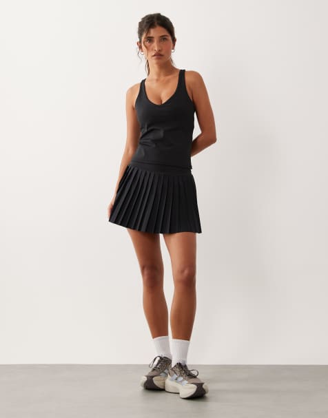 4505 - Active - Sort tennisnederdel med læg og indvendige shorts - view 1
