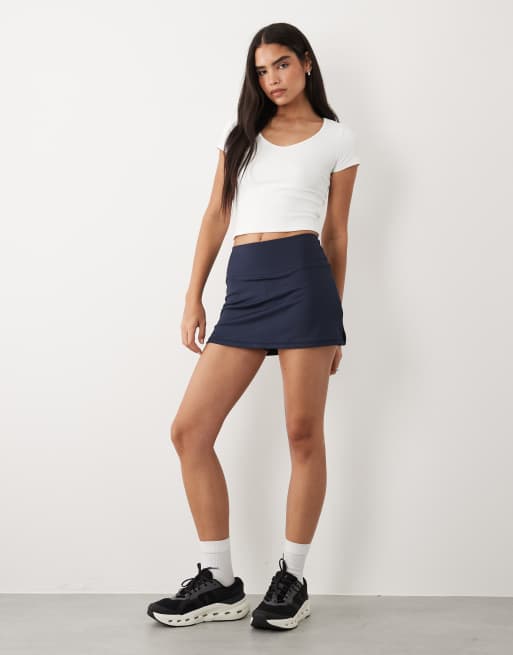 4505 active tennis skirt with under shorts and phone pocket in deep navy, 2 of 5