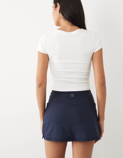 4505 active tennis skirt with under shorts and phone pocket in deep navy, 5 of 5