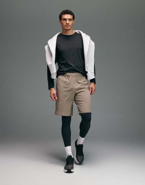 4505 – Beige, lediga träningsshorts i snabbtorkande material med fickor med dragkedja, 10 tum - view 1