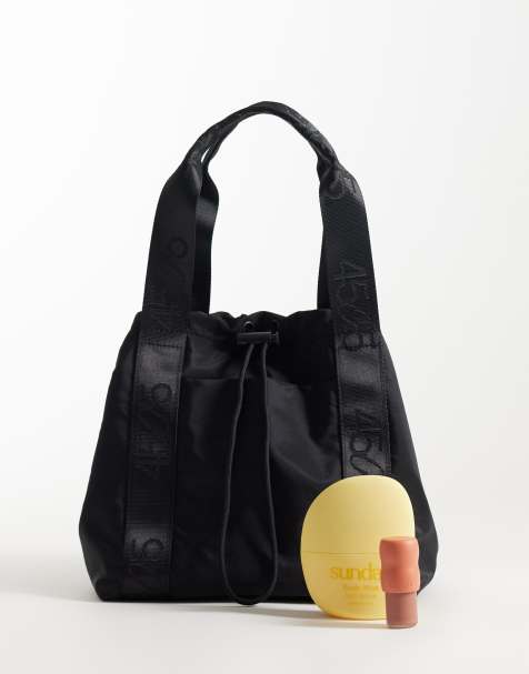 4505 – Beuteltasche in Flechtoptik in Schwarz mit verstellbarem Kordelzug und Außenfach - view 1