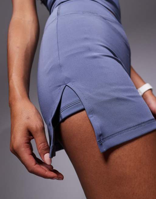 4505 – Blåklintsblå tenniskjol med omlottdesign i midjan, mobilficka och shorts undertill, 5 av 5