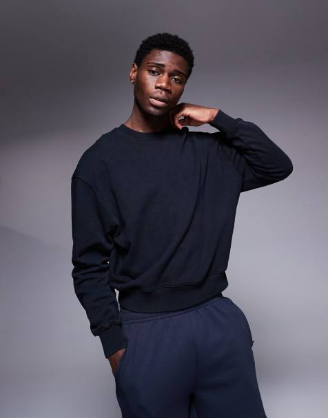 4505 – Bleksvart, kort sweatshirt för träningen i snabbtorkande material med boxig passform - view 1