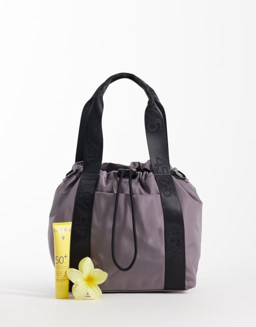 4505 - Bolso bombonera gris tormenta con cordón ajustable y bolsillo exterior de tejido liso