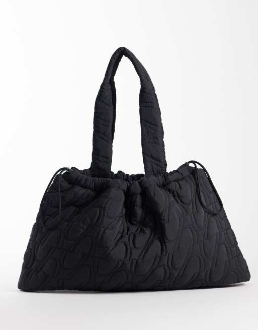 4505 - Bolso tote negro guateado con logo y cordón ajustable de tejido liso, 2 de 4