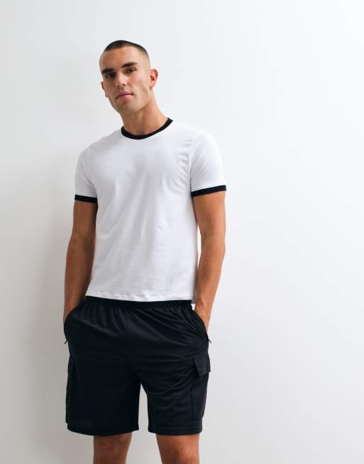 4505 camiseta ringer de algodón de corte ajustado y efecto encogido con acabado de secado rápido en blanco, 4 de 5