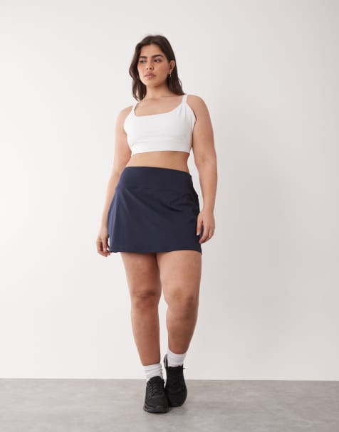 4505 Curve - Actief tennisrokje met overslag aan de taille, short onder en telefoonzakje in diep marineblauw - view 1