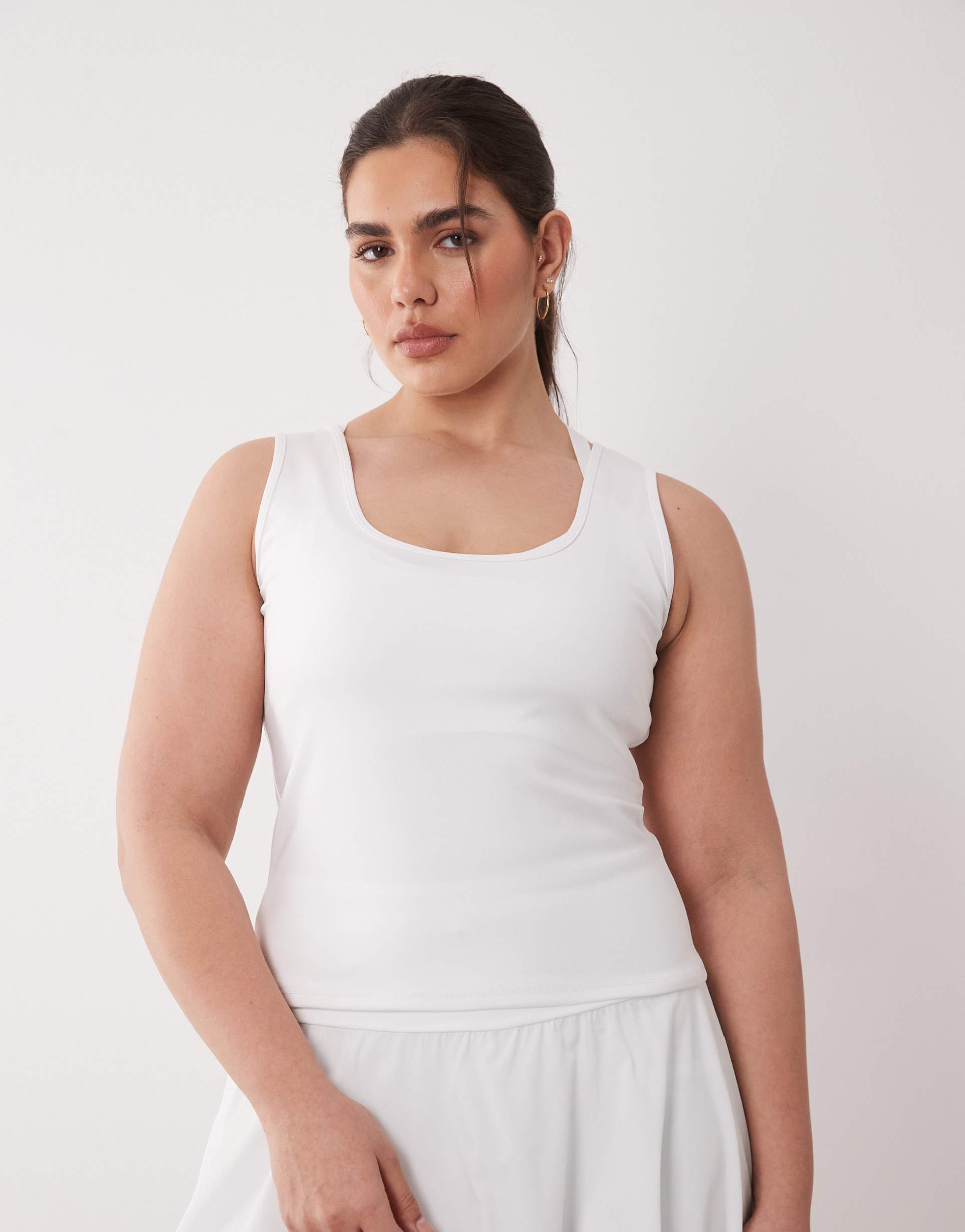 4505 curve icon active slightly cropped tank top in white