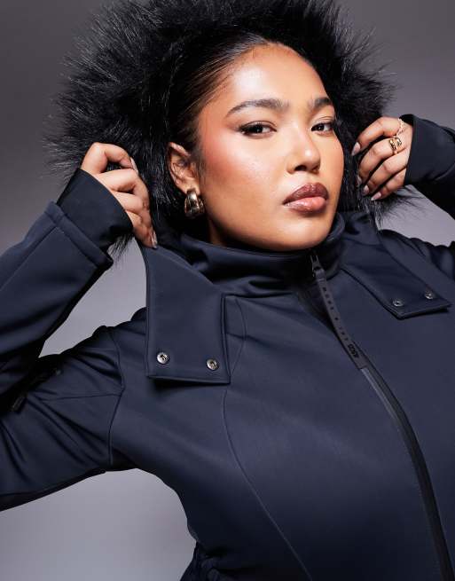 ASOS 4505 Curve Icon belted ski suit with slim kick leg and faux fur hood in black