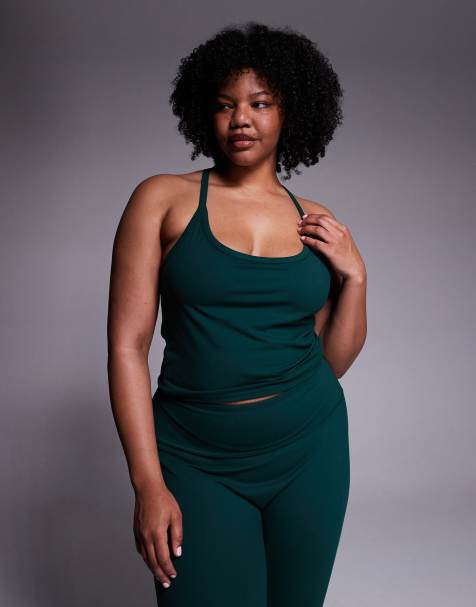 4505 Curve - Icon - Canottiera da yoga morbida al tatto color sempreverde con reggiseno interno e spalline regolabili - view 1