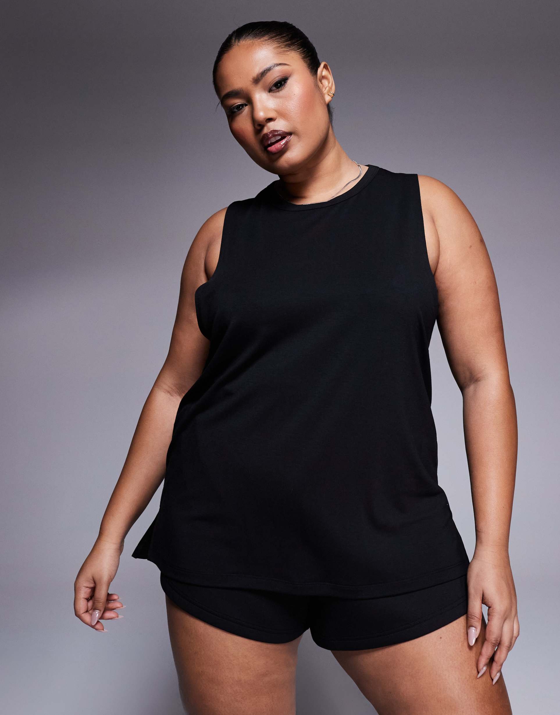 4505 curve icon quick dry performance drop armhole tank top in black