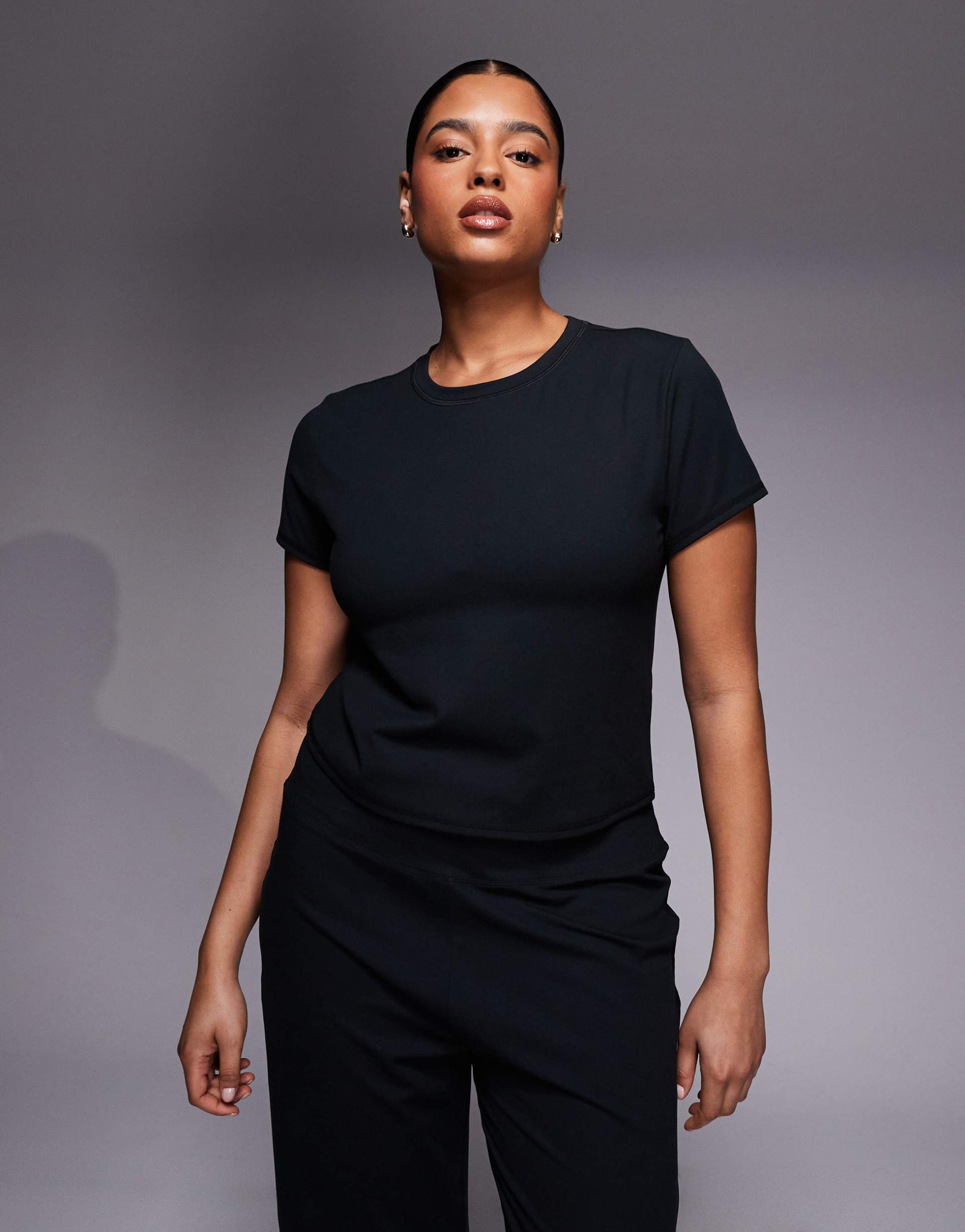 4505 curve icon soft touch studio baby t-shirt in black