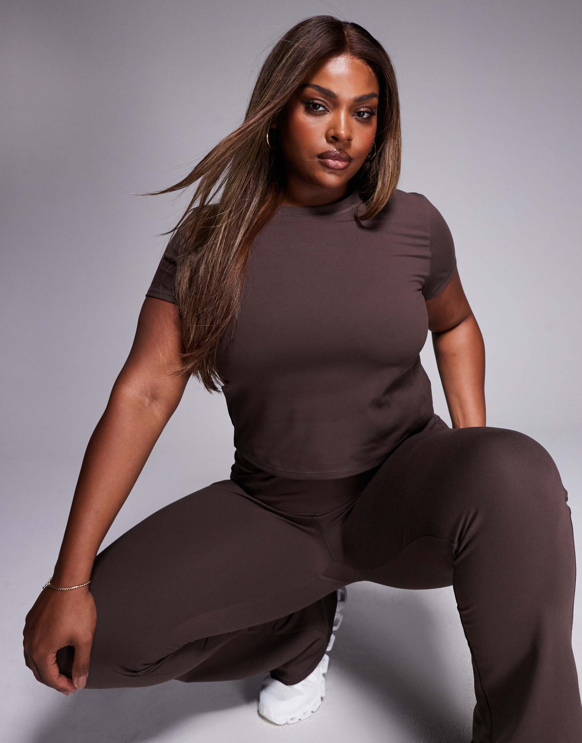 4505 curve icon soft touch studio baby t-shirt in plum chocolate