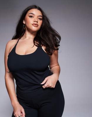 [ASOS] 4505 Curve Icon soft touch yoga cami with inner bra and adjustable straps in black 30 Black