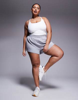 [ASOS] 4505 Curve Icon soft touch yoga cami with inner bra and adjustable straps in white 28 White