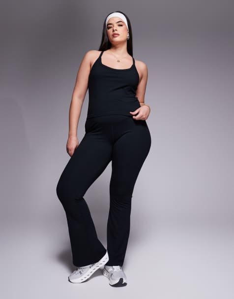 4505 Curve – Icon – Svart, mjuka, smala yogaleggings med omlottmidja och utsvängda ben - view 1