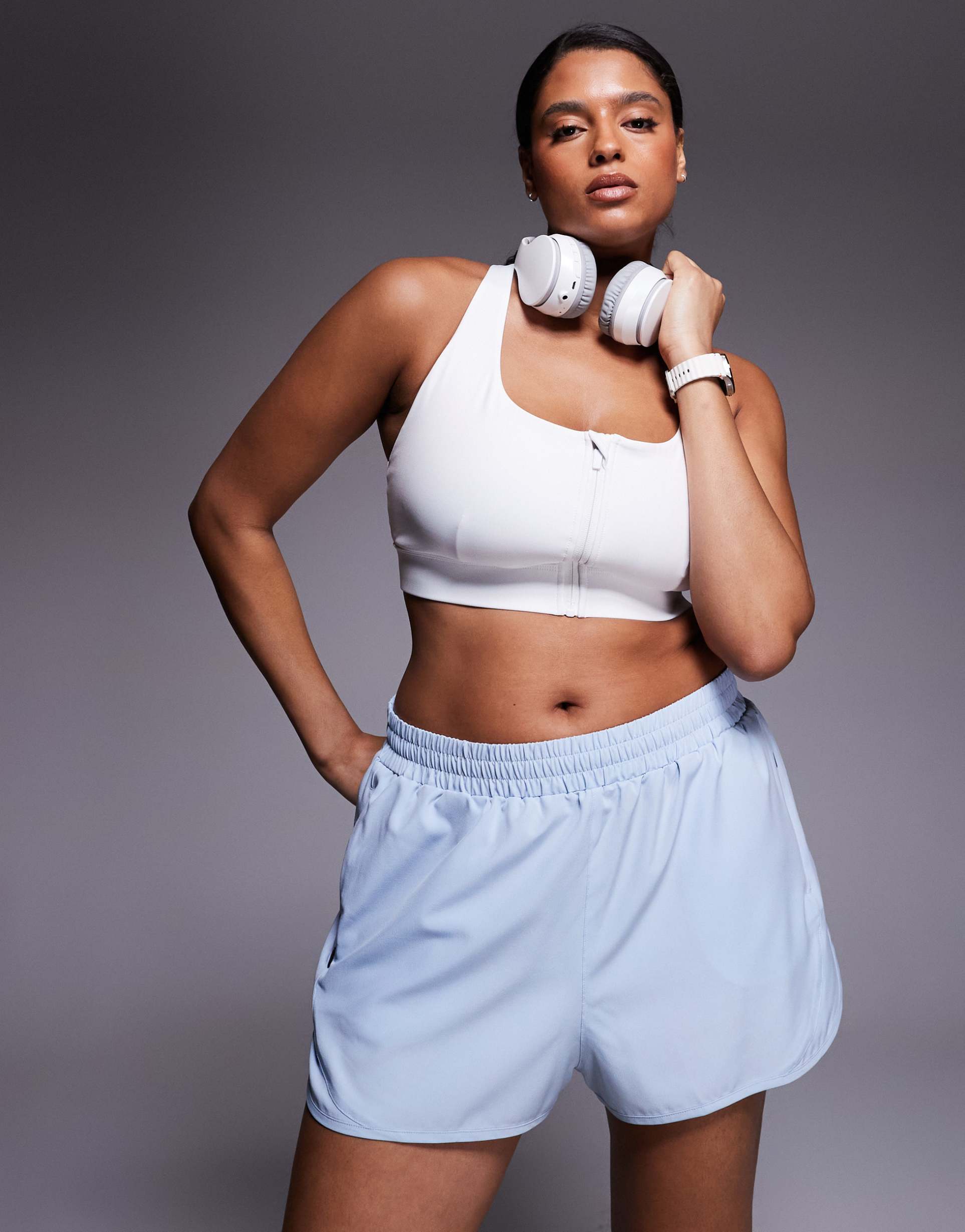 4505 curve icon woven run shorts with zip pockets in ice blue