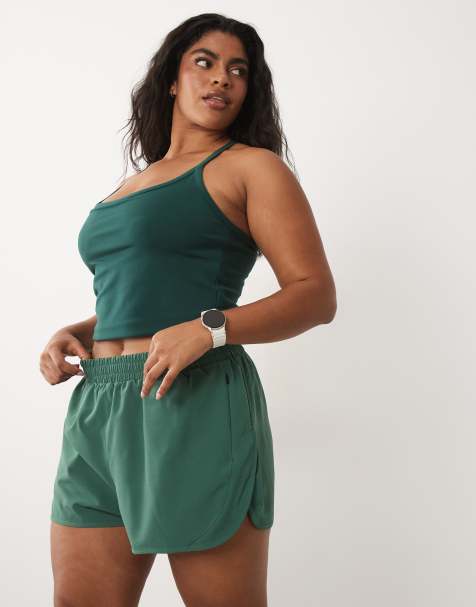 4505 Curve Icon woven run shorts with zip pockets in spruce - view 1