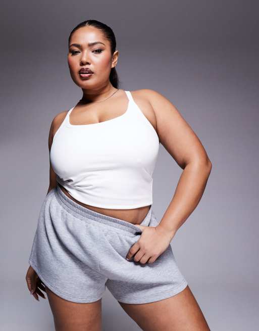 4505 - Curve - Icon - Zacht yoga cami-hemdje met ingebouwde bh en logo in wit 
