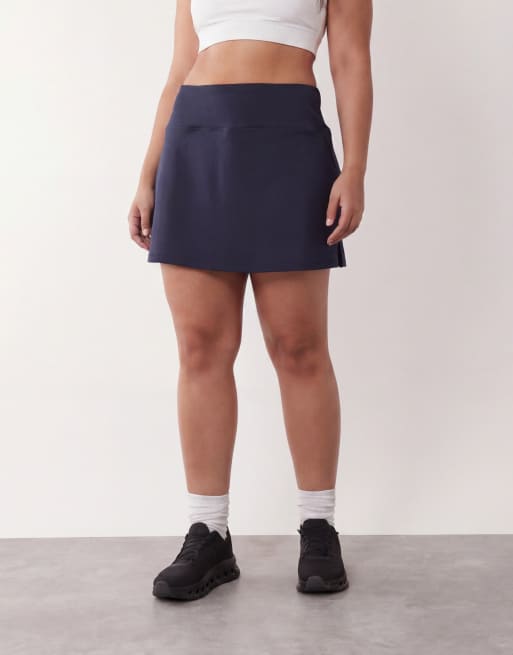 4505 Curve – Marinblå tenniskjol med shorts undertill och mobilficka, 2 av 5