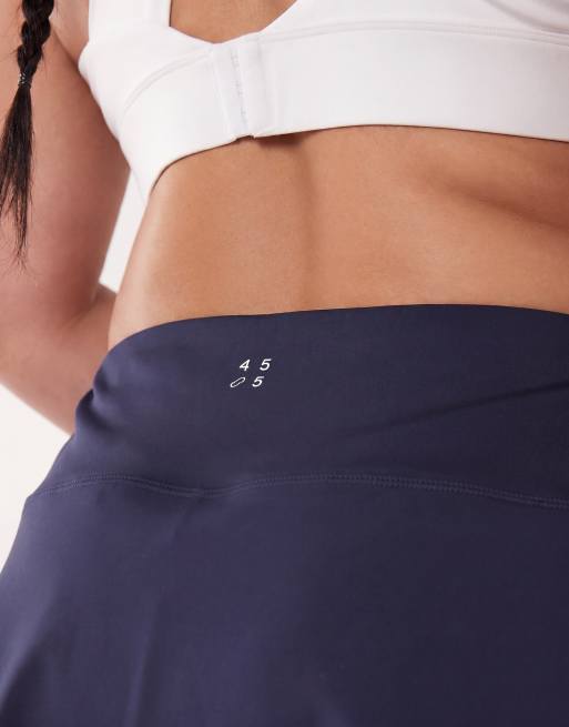 4505 Curve – Marinblå tenniskjol med shorts undertill och mobilficka, 5 av 5