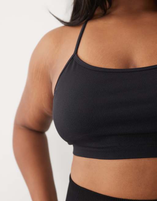 4505 Curve seamless baby rib medium support sports bra with removable padding in black, 4 of 4